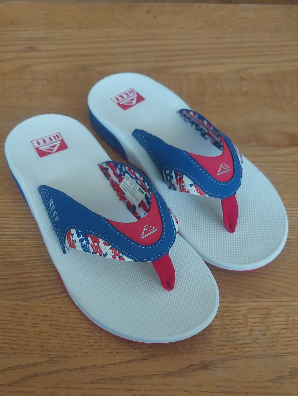Reef Men's White, Blue & Red Flip Flop Sandals Fanning W/ Bottle Opener